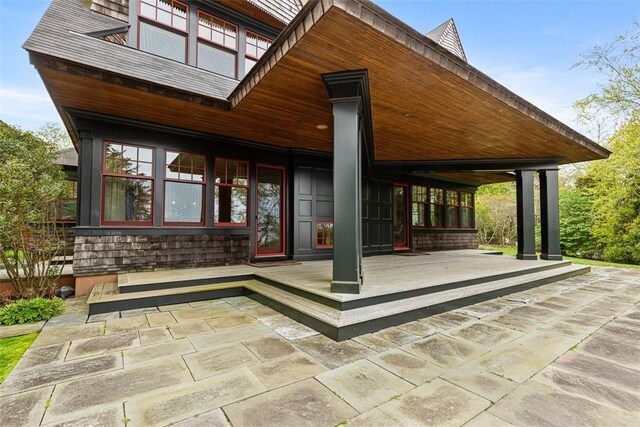 25 Walnut St, Jamestown, RI 02835 - rear view of property featuring a patio area