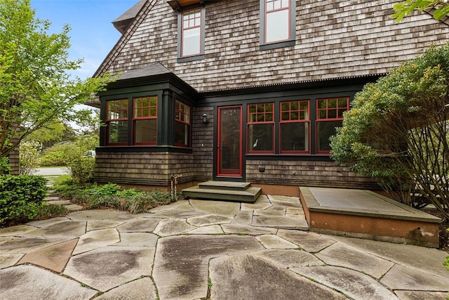 25 Walnut St, Jamestown, RI 02835 - back of house with entry steps and a patio area