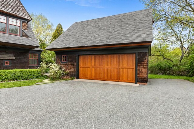 25 Walnut St, Jamestown, RI 02835 - garage featuring asphalt driveway