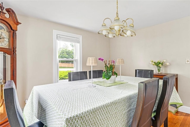 33 Upland Way, Barrington, RI 02806 - dining space with a chandelier and wood finished floors