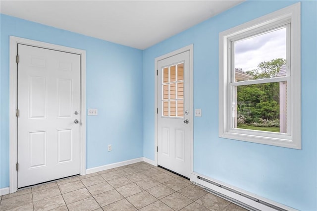 33 Upland Way, Barrington, RI 02806 - foyer entrance featuring a baseboard heating unit and light tile patterned floors