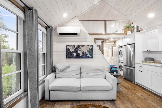12 Alexander Cir Unit Th2, Richmond, RI 02898 - living area with stacked washer and clothes dryer, vaulted ceiling, a wall mounted air conditioner, wood ceiling, and dark wood-style floors