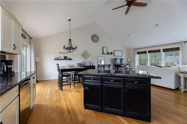 38 Pleasant View Dr, Hopkinton, RI 02832 - kitchen featuring dark cabinets, stainless steel dishwasher, open floor plan, a ceiling fan, and vaulted ceiling