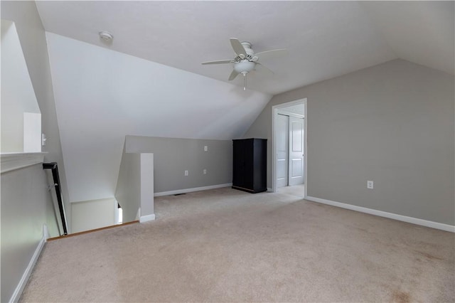 38 Pleasant View Dr, Hopkinton, RI 02832 - additional living space featuring lofted ceiling, light colored carpet, a ceiling fan, and baseboards