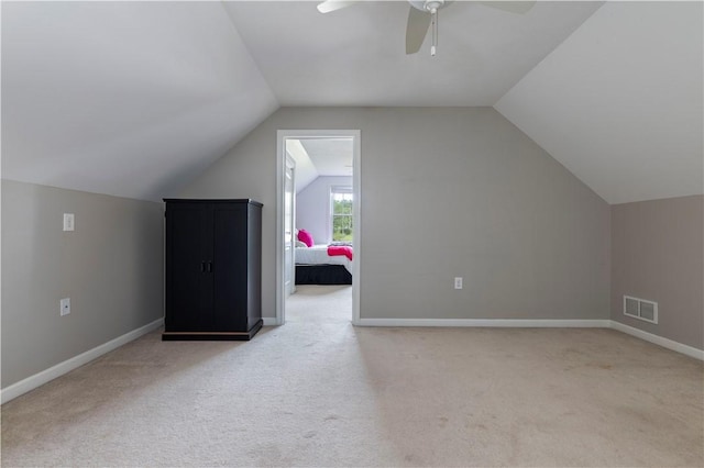 38 Pleasant View Dr, Hopkinton, RI 02832 - bonus room with light colored carpet, lofted ceiling, a ceiling fan, and baseboards