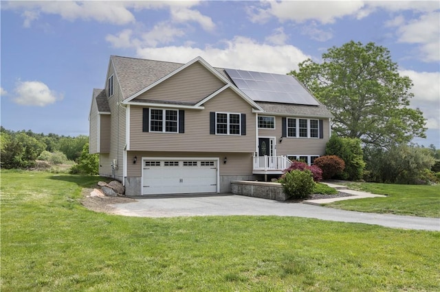38 Pleasant View Dr, Hopkinton, RI 02832 - bi-level home with driveway, solar panels, a garage, and a front yard
