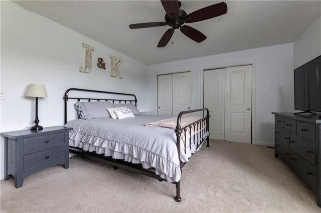 38 Pleasant View Dr, Hopkinton, RI 02832 - bedroom with two closets, light colored carpet, ceiling fan, and baseboards