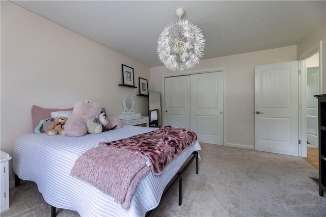 38 Pleasant View Dr, Hopkinton, RI 02832 - bedroom with light carpet, a closet, a chandelier, and baseboards
