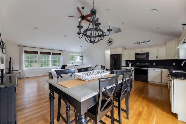 38 Pleasant View Dr, Hopkinton, RI 02832 - dining area with a chandelier, light wood finished floors, ceiling fan, and high vaulted ceiling