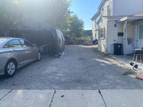 118 Brookside Ave, West Warwick, RI 02893 - view of asphalt driveway