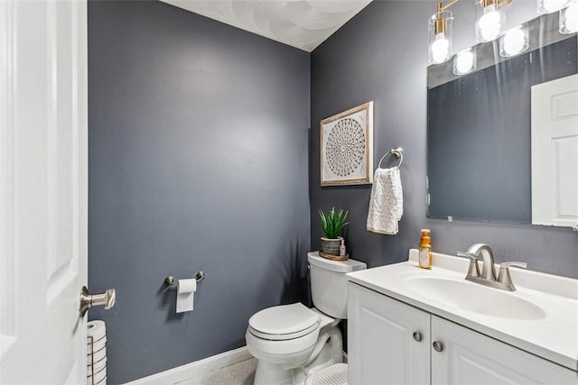121 Greenbush Rd, Warwick, RI 02818 - half bath featuring toilet, vanity, and baseboards