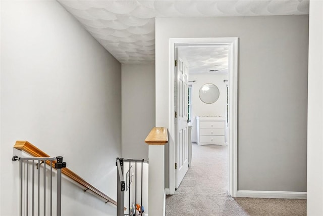 121 Greenbush Rd, Warwick, RI 02818 - corridor featuring an upstairs landing, light carpet, and baseboards