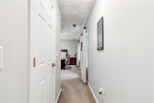 121 Greenbush Rd, Warwick, RI 02818 - hall with light carpet and baseboards