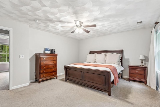 121 Greenbush Rd, Warwick, RI 02818 - bedroom featuring light colored carpet, a ceiling fan, a textured ceiling, and baseboards
