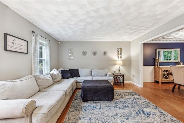121 Greenbush Rd, Warwick, RI 02818 - living room with wood finished floors and baseboards