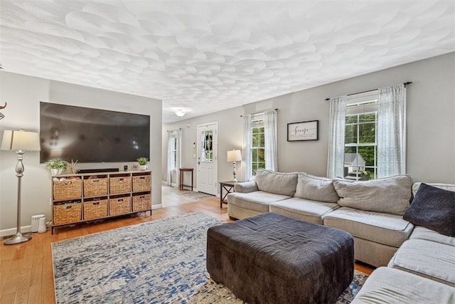 121 Greenbush Rd, Warwick, RI 02818 - living area featuring wood finished floors and baseboards