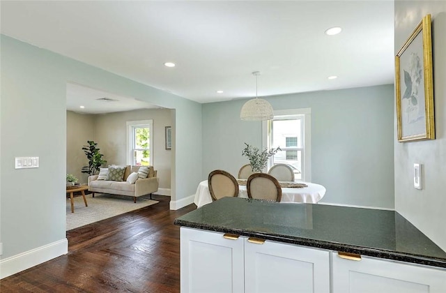 101 Knollwood Ave, Cranston, RI 02910 - kitchen with baseboards, dark wood-type flooring, white cabinetry, pendant lighting, and recessed lighting