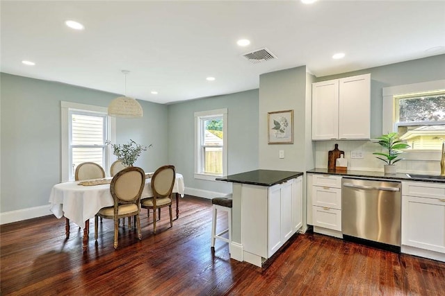 101 Knollwood Ave, Cranston, RI 02910 - kitchen featuring dishwasher, a sink, dark countertops, dark wood-type flooring, and recessed lighting