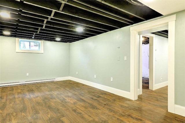 101 Knollwood Ave, Cranston, RI 02910 - below grade area with wood finished floors, a baseboard radiator, and baseboards