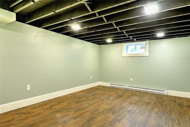 101 Knollwood Ave, Cranston, RI 02910 - basement with baseboard heating, baseboards, and wood finished floors