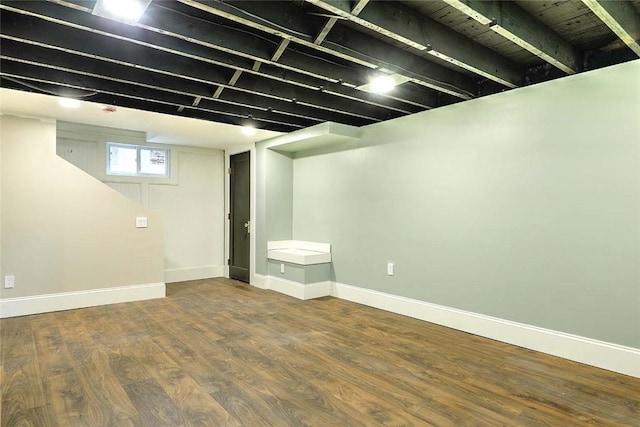 101 Knollwood Ave, Cranston, RI 02910 - basement with wood finished floors and baseboards