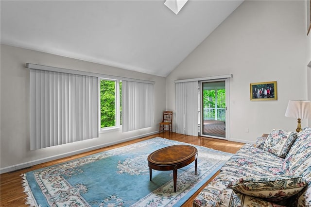 84 River Farms Dr Unit 84, West Warwick, RI 02893 - living room with high vaulted ceiling, wood finished floors, and baseboards