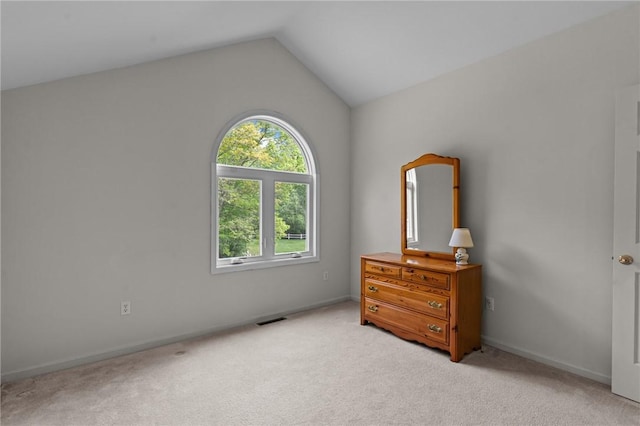 84 River Farms Dr Unit 84, West Warwick, RI 02893 - bedroom featuring light carpet, lofted ceiling, and baseboards
