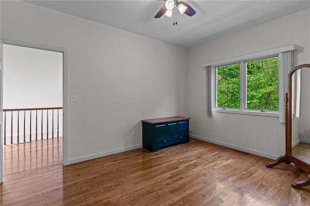 84 River Farms Dr Unit 84, West Warwick, RI 02893 - empty room with wood finished floors, a ceiling fan, and baseboards