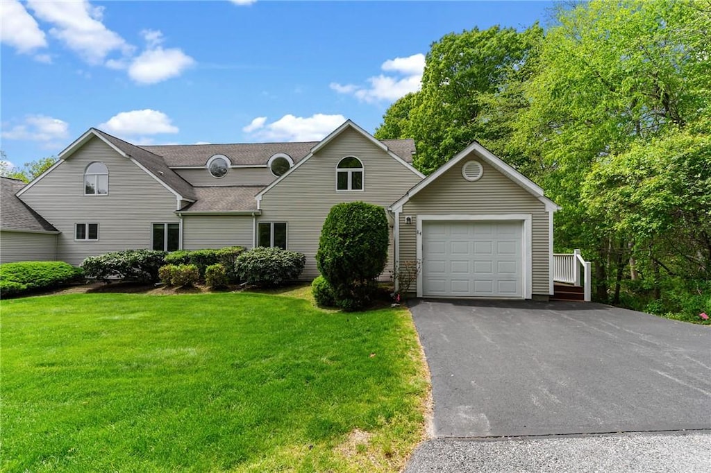84 River Farms Dr Unit 84, West Warwick, RI 02893 - view of front of property featuring an outbuilding, a front yard, driveway, and a shingled roof