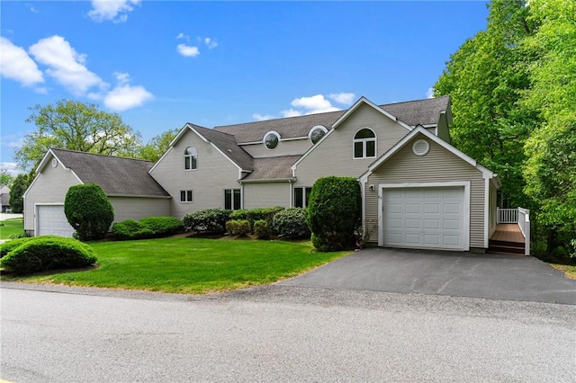 84 River Farms Dr Unit 84, West Warwick, RI 02893 - traditional home featuring a front lawn, driveway, and a shingled roof