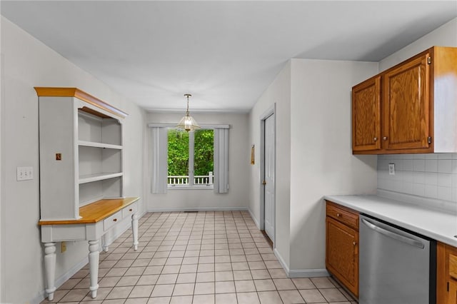 84 River Farms Dr Unit 84, West Warwick, RI 02893 - kitchen with dishwasher, light countertops, tasteful backsplash, baseboards, and brown cabinetry