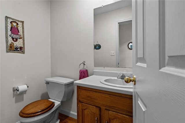 84 River Farms Dr Unit 84, West Warwick, RI 02893 - half bathroom with toilet, vanity, and baseboards