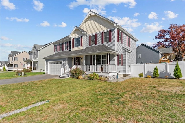132 Theresa Marie Ave, Woonsocket, RI 02895 - view of front of home with covered porch, driveway, and a residential view