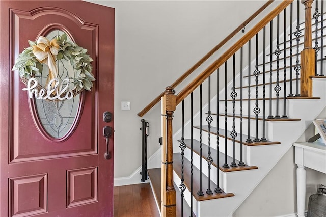 132 Theresa Marie Ave, Woonsocket, RI 02895 - foyer featuring baseboards, wood finished floors, and stairs