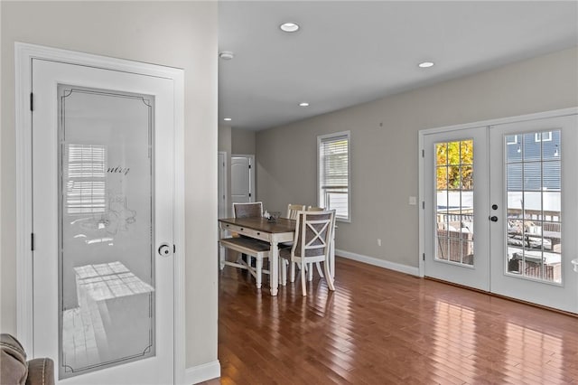 132 Theresa Marie Ave, Woonsocket, RI 02895 - dining room featuring wood finished floors, french doors, recessed lighting, and baseboards