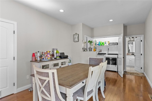 132 Theresa Marie Ave, Woonsocket, RI 02895 - dining room with separate washer and dryer, hardwood / wood-style floors, baseboards, and recessed lighting