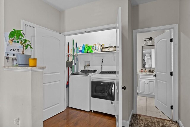 132 Theresa Marie Ave, Woonsocket, RI 02895 - washroom with independent washer and dryer and wood finished floors