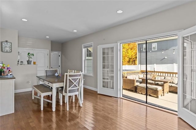 132 Theresa Marie Ave, Woonsocket, RI 02895 - dining area with baseboards, wood finished floors, and recessed lighting