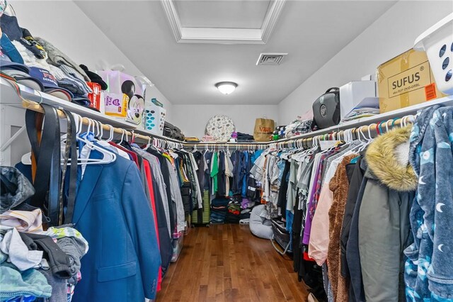 132 Theresa Marie Ave, Woonsocket, RI 02895 - spacious closet featuring attic access and hardwood / wood-style flooring