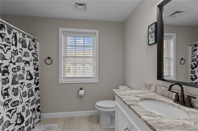 132 Theresa Marie Ave, Woonsocket, RI 02895 - bathroom with vanity, toilet, tile patterned flooring, baseboards, and a shower with shower curtain