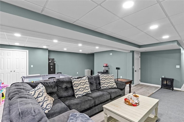 132 Theresa Marie Ave, Woonsocket, RI 02895 - living area with a paneled ceiling, recessed lighting, light carpet, and baseboards