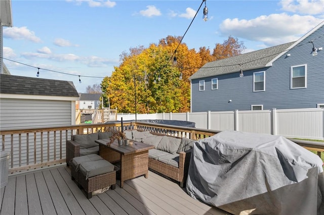 132 Theresa Marie Ave, Woonsocket, RI 02895 - wooden terrace with outdoor lounge area, a fenced backyard, and grilling area