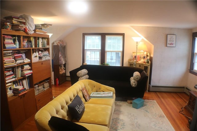 281 Auburn St, Cranston, RI 02910 - living area featuring baseboard heating, wood finished floors, and a baseboard radiator