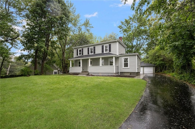 1056 Pontiac Ave, Cranston, RI 02920 - view of front of house with a porch, a chimney, an outbuilding, a front yard, and a garage
