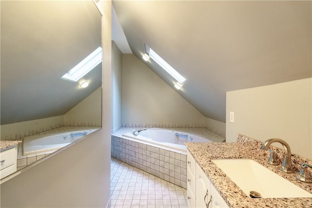 1291 Narragansett Blvd Unit 6, Cranston, RI 02905 - full bathroom with a skylight, vaulted ceiling, a bath, vanity, and tile patterned flooring