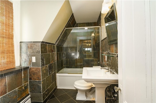 1291 Narragansett Blvd Unit 6, Cranston, RI 02905 - bathroom with tile walls, toilet, tile patterned floors, combined bath / shower with glass door, and a sink