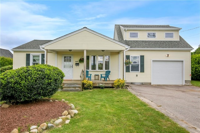 86 Weekapaug Rd, Westerly, RI 02891 - view of front facade featuring covered porch, a front yard, roof with shingles, an attached garage, and driveway