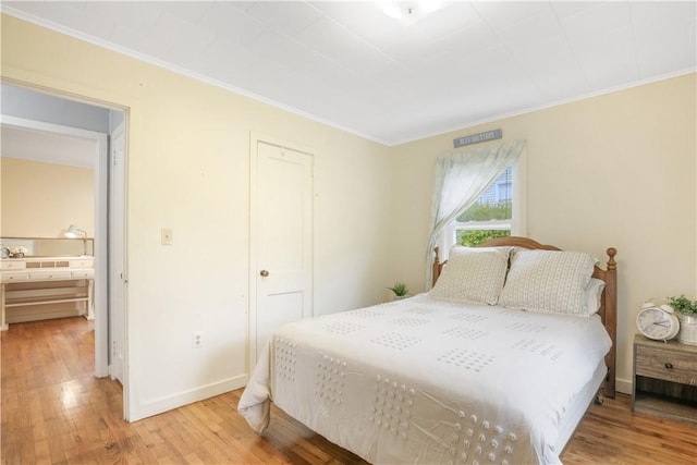 86 Weekapaug Rd, Westerly, RI 02891 - bedroom featuring light wood-style floors, ornamental molding, baseboards, and a closet
