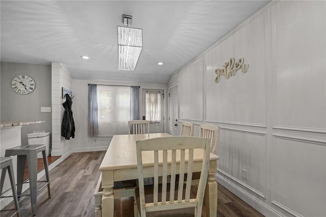 10 Bigelow Rd, Johnston, RI 02919 - dining space featuring dark wood-style flooring, a decorative wall, baseboards, and recessed lighting