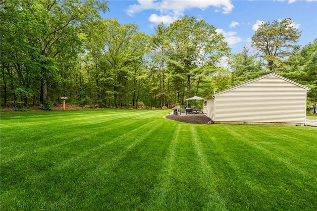 10 Bigelow Rd, Johnston, RI 02919 - view of grassy yard featuring a patio